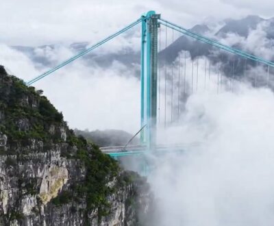 World’s Tallest: China’s Huajiang Grand Canyon Bridge Cuts Travel Time From 2 Hours To 2 Minutes! Watch Video World’s Tallest: China’s Huajiang Grand Canyon Bridge Cuts Travel Time From 2 Hours To 2 Minutes! Watch Video